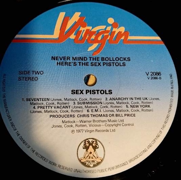 Flesh coloured Virgin logo on labels